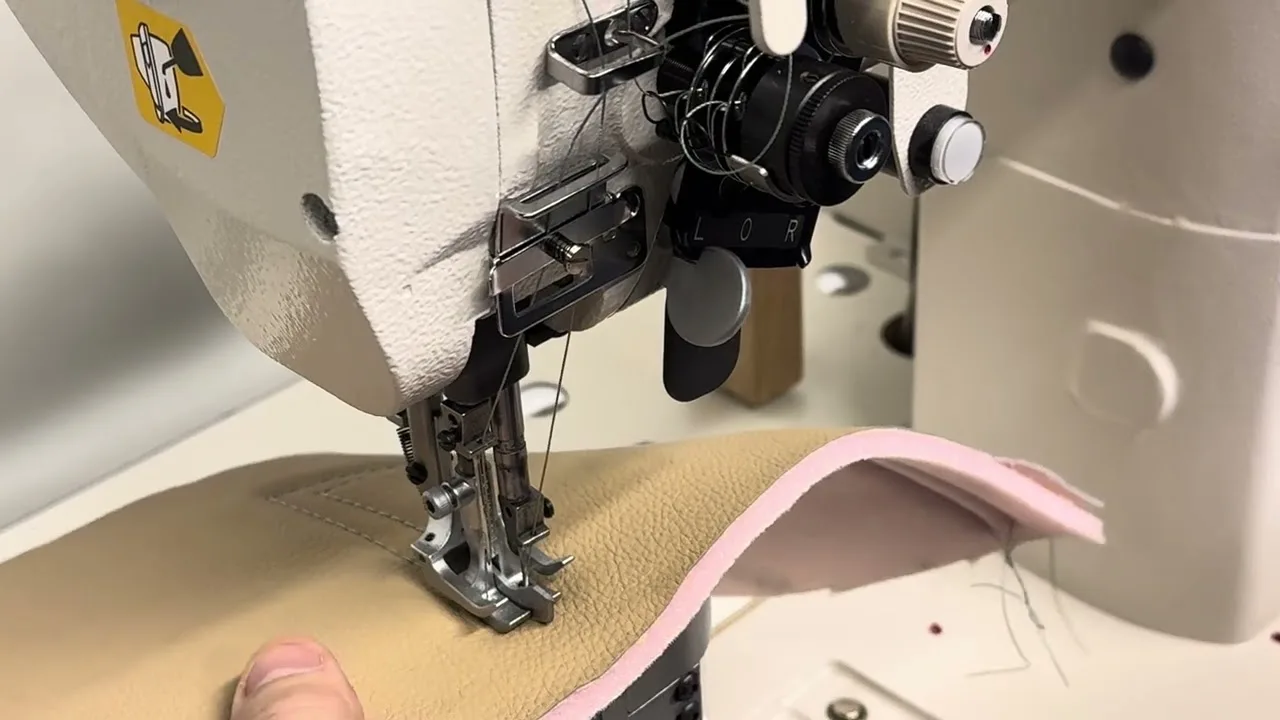 Light leather under the foot of a post bed machine