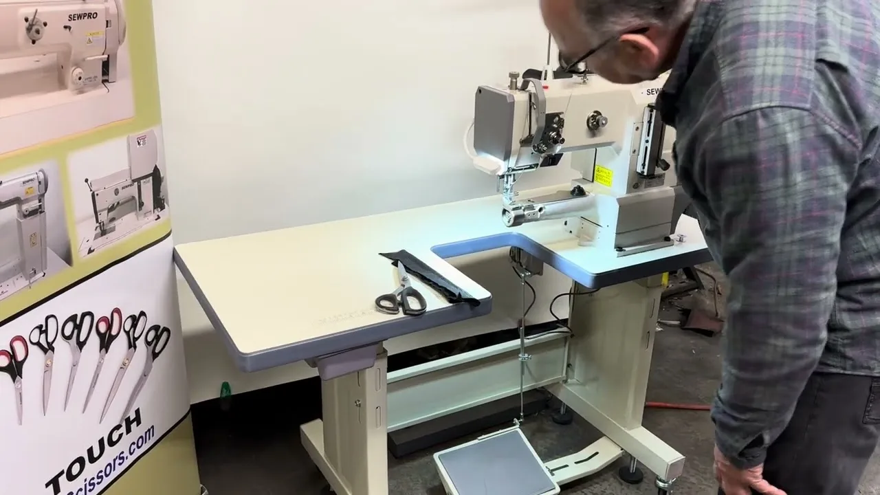 Sergey at a SEWPRO 335GA cylinder arm machine